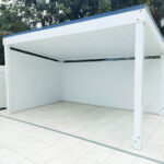 Pool Cabana with 2 walls and smooth plywood ceiling.