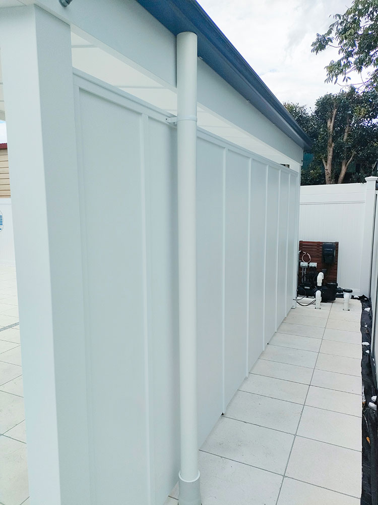 Pool Cabana back wall has HardieFlex Cladding and downpipe installed into stormwater connection.