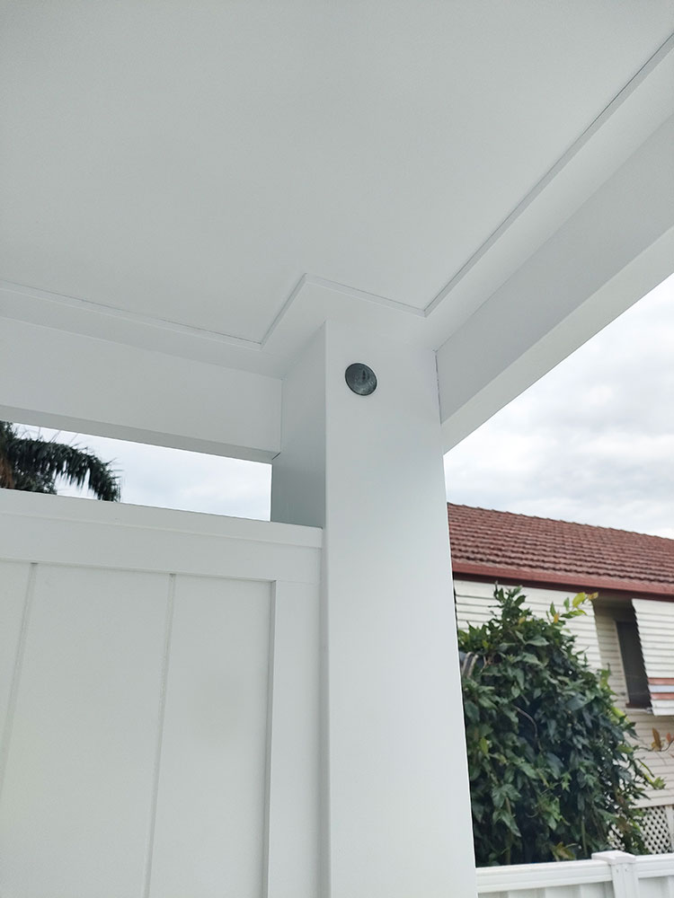 Finishing details on the wall and ceiling trim.