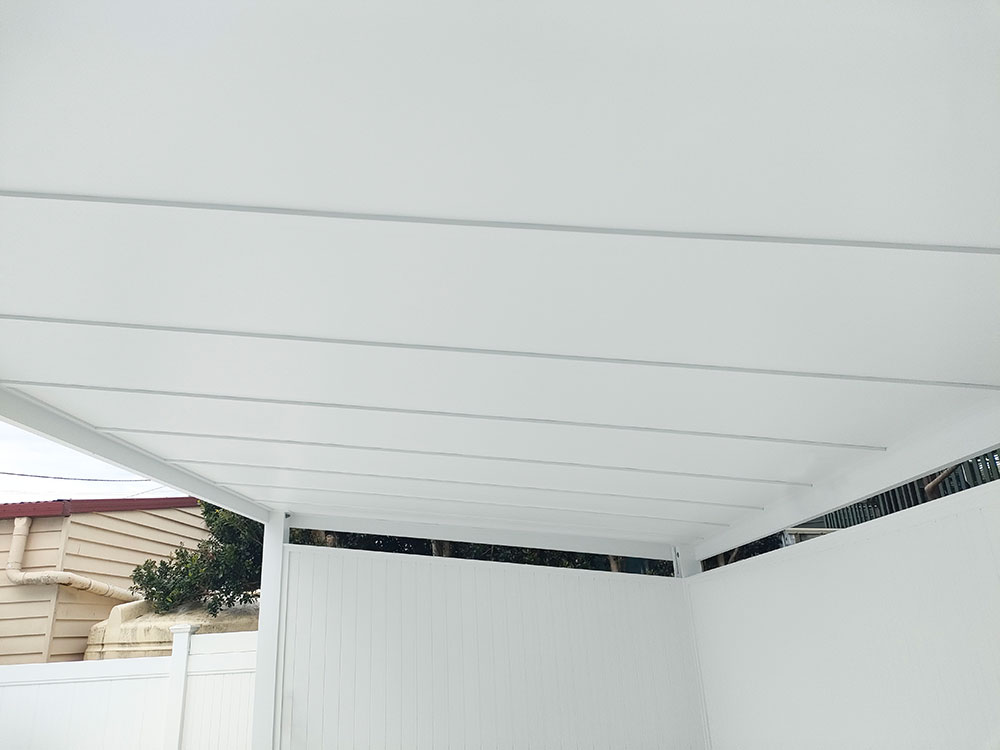 Smooth Plywood Ceiling with no visable fixings.