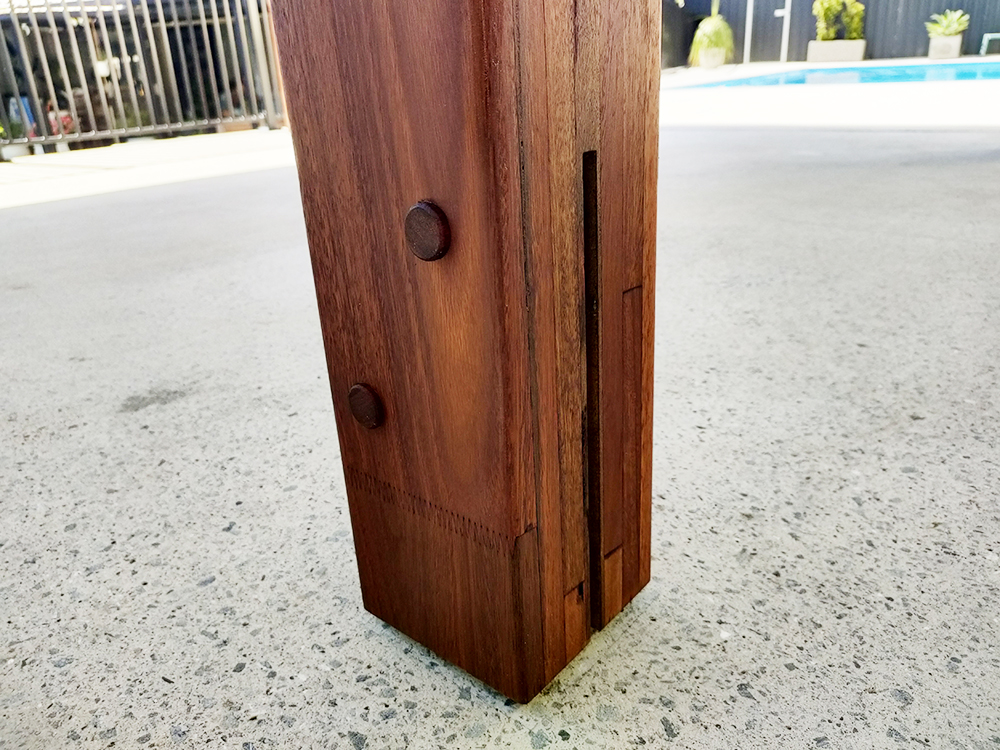 Laminated Spotted Gum Post with precision cut T-Blade Bracket installation.