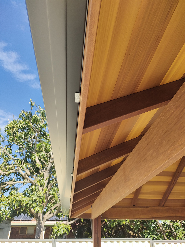 Seamless Cedar ceiling with exposed rafters.