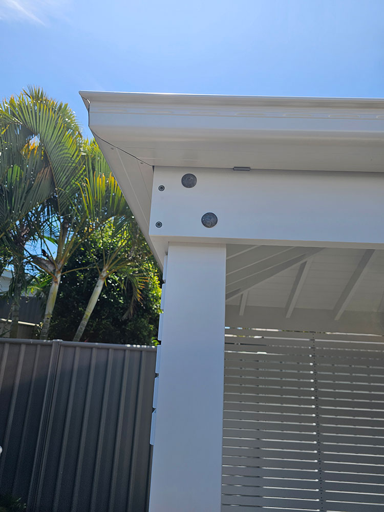 Gazebo with posts set in each corner to maximize space.